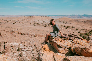 Woman in a desert. Travel and adventure. 