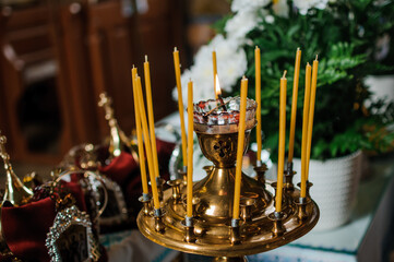 stand with candles in the church