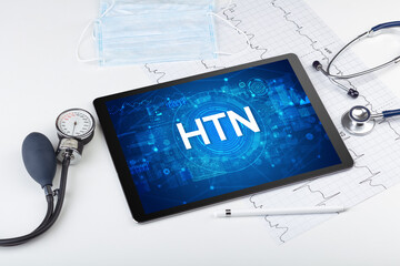 Close-up view of a tablet pc with medical abbreviation