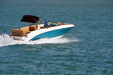 Motor boat speeding on the Florida Intra-Coastal Waterway off of Miami Beach.