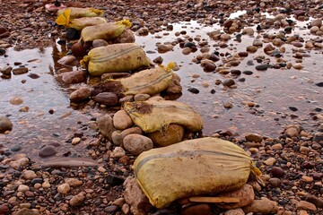 Primitive bridge across the mountain creek, Morocco, Northern Africa 
