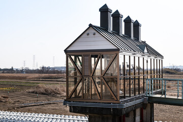 Fototapeta na wymiar 日本　旧北上川のとんがり屋根の水門