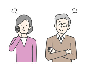 疑問ポーズのシニア夫婦