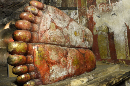 Decorated feet of Reclining Buddha image at Royal Rock Temple, Dambulla, Sri Lanka