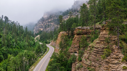 Fog in the morning on Spearfish Canyon Scenic Byway, South Dakota Black Hills	