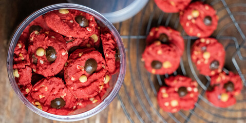Red velvet cookies in a container. Selective focus.