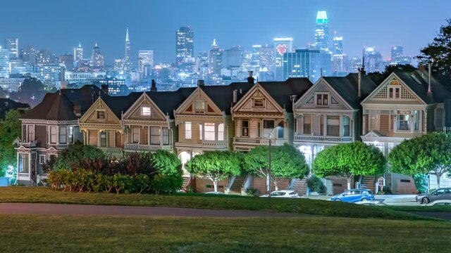 San Francisco Painted Ladies and Downtown Financial District Skyline Night Time Lapse California USA