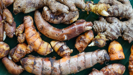 Close up of turmeric root and ginger root