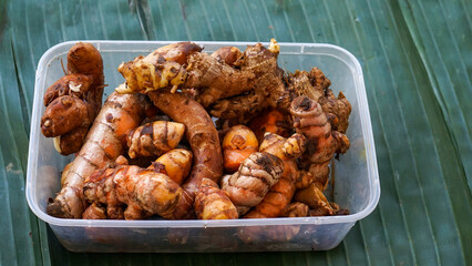 Close up of turmeric root and ginger root