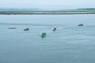 Fototapeta na wymiar boats were going to Sittwe for transporting material from the Northern part of Rakhine, Myanmar. 
