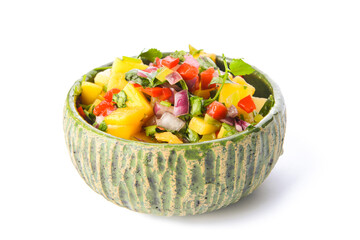 Bowl with fresh mango salsa on white background