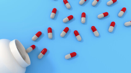 Prescription medication, pharmaceutical treatment and pain management concept with white red pills capsules isolated on blue background with bottle