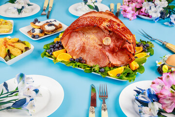 Hickory smoked sliced ham on festive table.