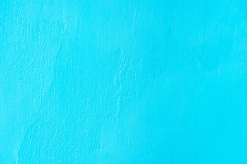 The wall is plastered and painted blue as a natural background