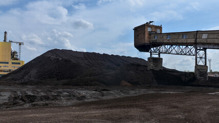 Fototapeta na wymiar coal stockpile at power station (Krasnoyarsk Krai, Russia)