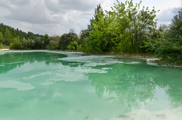 cyan-colored water in ash ponds near Nazarovo district power station (Krasnoyarsk Krai, Russia)