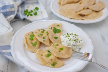 Pierogi ruskie, Baked dumplings stuffed with curd cheese and potatoes