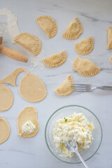 Pierogi ruskie, Baked dumplings stuffed with curd cheese and potatoes