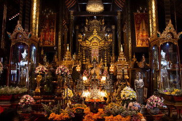 Interior decoration design ubosot ordination hall for thai people and foreign travelers travel visit respect praying in Wat Pa Daraphirom Temple at Mae Rim on December 2, 2020 in Chiang Mai, Thailand