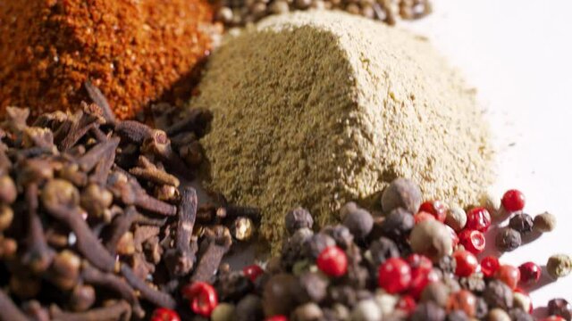 Different spices on white background, closeup