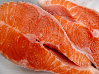 Raw red fresh salmon steak close up