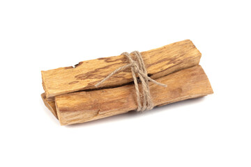 Palo Santo tree sticks isolated on white - holy incense tree from Latin America. Meditation, mental health and personal fulfilment concept. Selective focus