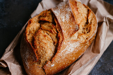 beautiful buckwheat bread on kraft paper on a dark background