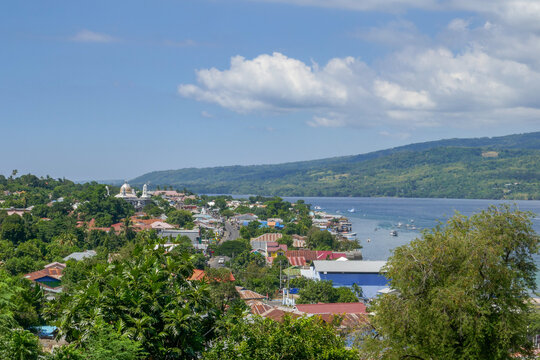 Landscape view of Larantuka city and the strait separating it from Adonara island, East Flores, East Nusa Tenggara, Indonesia