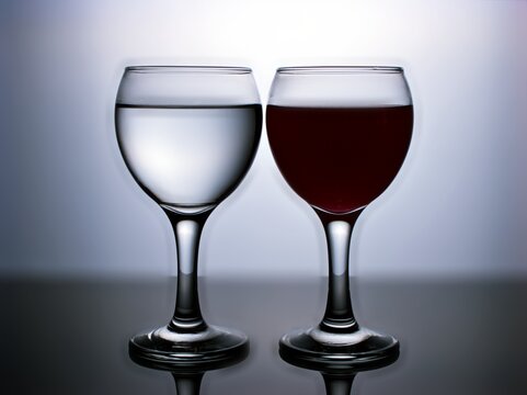 Glass of water isolated in black and white image for background ,glass of wine ,dinner ware ,glass of red wine