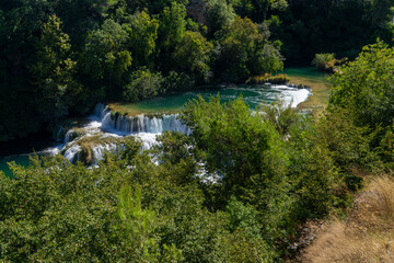 Fototapeta na wymiar Krka national park, famous travel destination in Dalmatia of Croatia. Krka waterfalls in the Krka National Park in autumn, Croatia