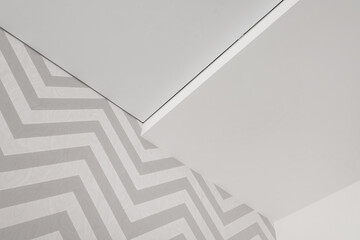 Detail of corner ceiling cornice with intricate crown moulding.