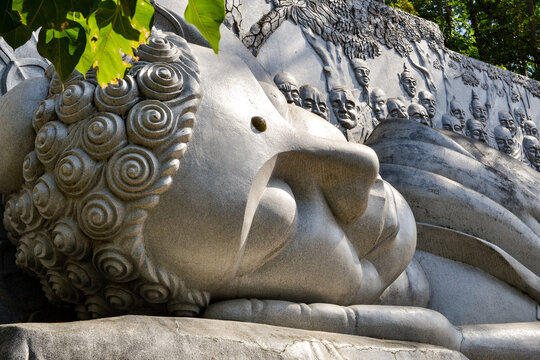 NHA TRANG, VIETNAM - JANUARY 20, 2020: reclining Buddha. Giant sculpture of the reclining Buddha at Long Son Pagoda
