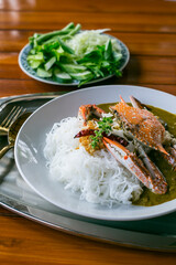 
Food Concept: Southern Thai dish of Crabmeat Curry traditionally served with fermented rice noodle