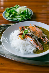
Food Concept: Southern Thai dish of Crabmeat Curry traditionally served with fermented rice noodle