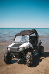 Fototapeta na wymiar ATV on the seashore. extreme outdoor sports