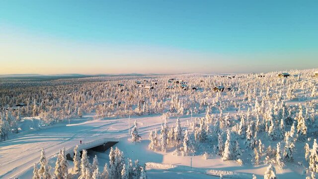 Beautiful vibrant sunny scandinavian winter landscape of skiing resort, lapland