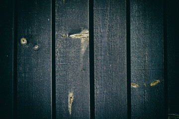 Texture of old, shabby, cracked dark planks. Vignette. Backgrounds.