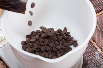 Pour the chocolate chips into a white bowl.