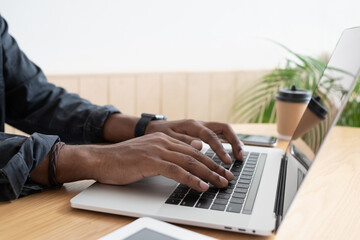 Man hands typing on computer keyboard closeup, businessman or student using laptop at office, online learning, internet marketing, working from home, home workplace freelance concept