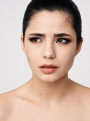 Obraz premium pretty woman cosmetics on face naked shoulders clear skin model