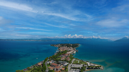 Fototapeta na wymiar Panoramic view of the resort town of Sirmione, Lake Garda, Italy. Sirmione, Lake Garda, Italy.