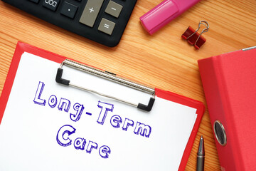 Business concept meaning Long-Term Care with sign on the page.