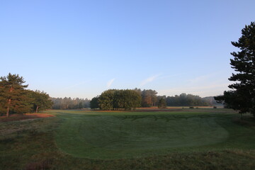 Golfcourse with beautiful sky and lights with green grass