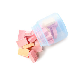 Jar with tasty chewing gums on white background