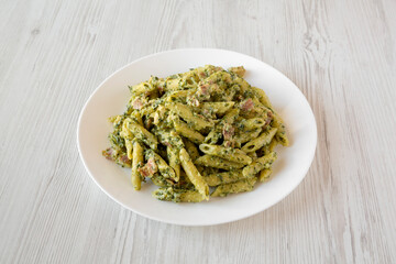 Homemade One-Pot Chicken Spinach Bacon Alfredo Pasta Ready to Eat, low angle view.