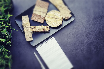 Tilt shift effect.Concept of losing weight and a healthy lifestyle. Bread roll with vegetables and...