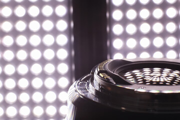 Equipment videographer and photographer. Lenses on the table against the background of bright...