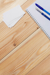 notepad pen desk wooden background office object Copy Space