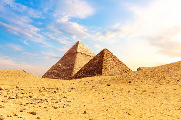 Fototapeta na wymiar The Pyramids of Egypt, Khafre and Menkaure, view from sand-dunes, Giza