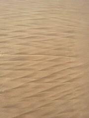 rare and extraordinary sand texture patterns at beach forming triangles